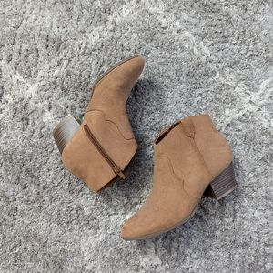 Tan booties with chunkie heel.